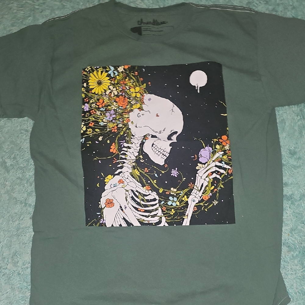 Green Graphic Tee with Skeleton and Floral Design